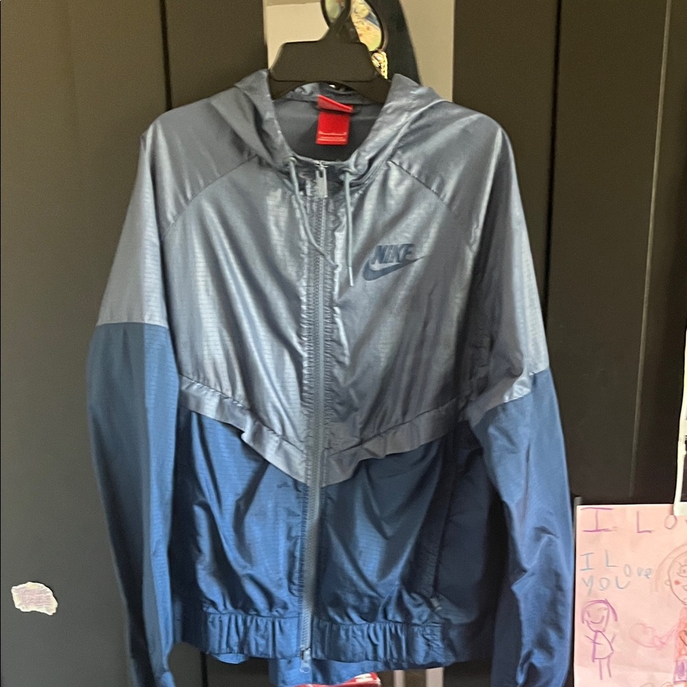 Blue windbreaker jacket